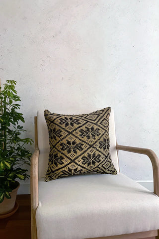Cojín peruano étnico amarillo y negro
