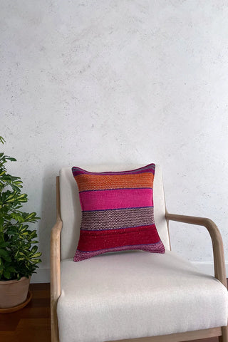 Cojín peruano étnico naranja y rosa
