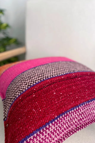 Cojín peruano étnico naranja y rosa