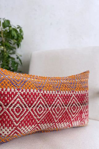 Cojín étnico rojo y naranja