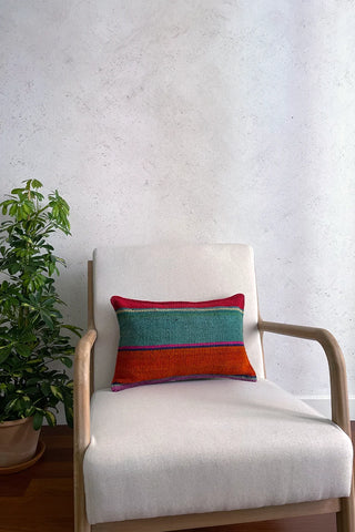 Cojín étnico verde y naranja