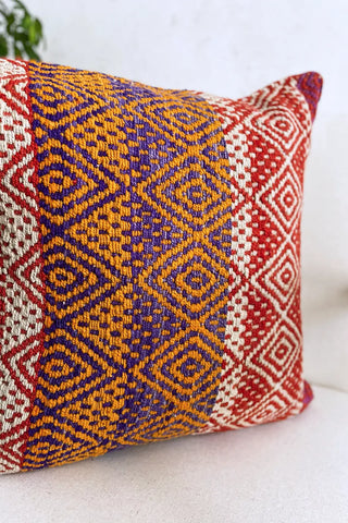 Cojín peruano a rojo y naranja