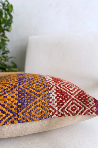 Cojín peruano a rojo y naranja