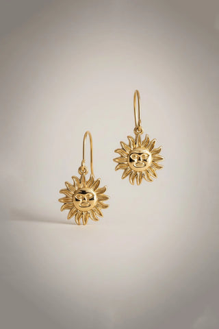 Pendientes de acero dorados Inti